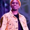 Anderson.Paak wearing all orange on stage