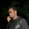 Diddy Seen Talking To Ex-NBA Player In Prison Yard Photo