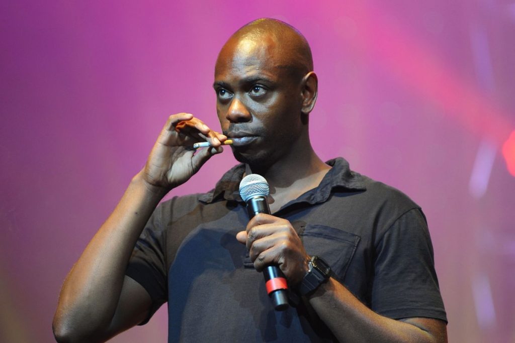 Dave Chappelle Addresses Diddy, Baby Oil & Charlie Kirk In Netflix Special "Dave Chappelle: The Unstoppable..."